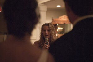 Taylor sings the couple a song a cappella (American Idol?)