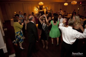 With their hands in the air...