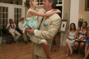 Daddy & his littlest girl dance and sing together.