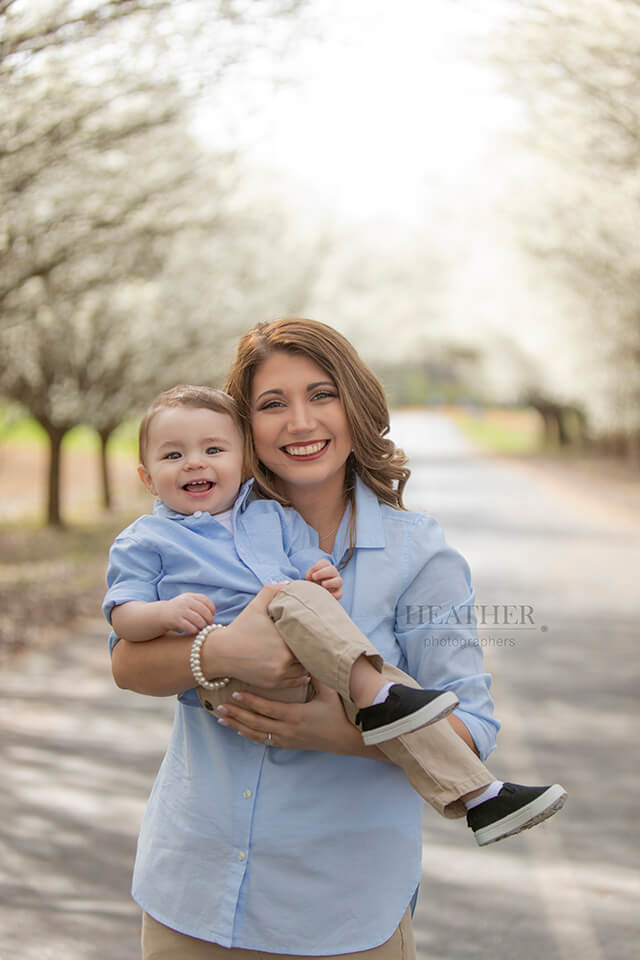 Mom with Child under Bradford Pear Blossoms